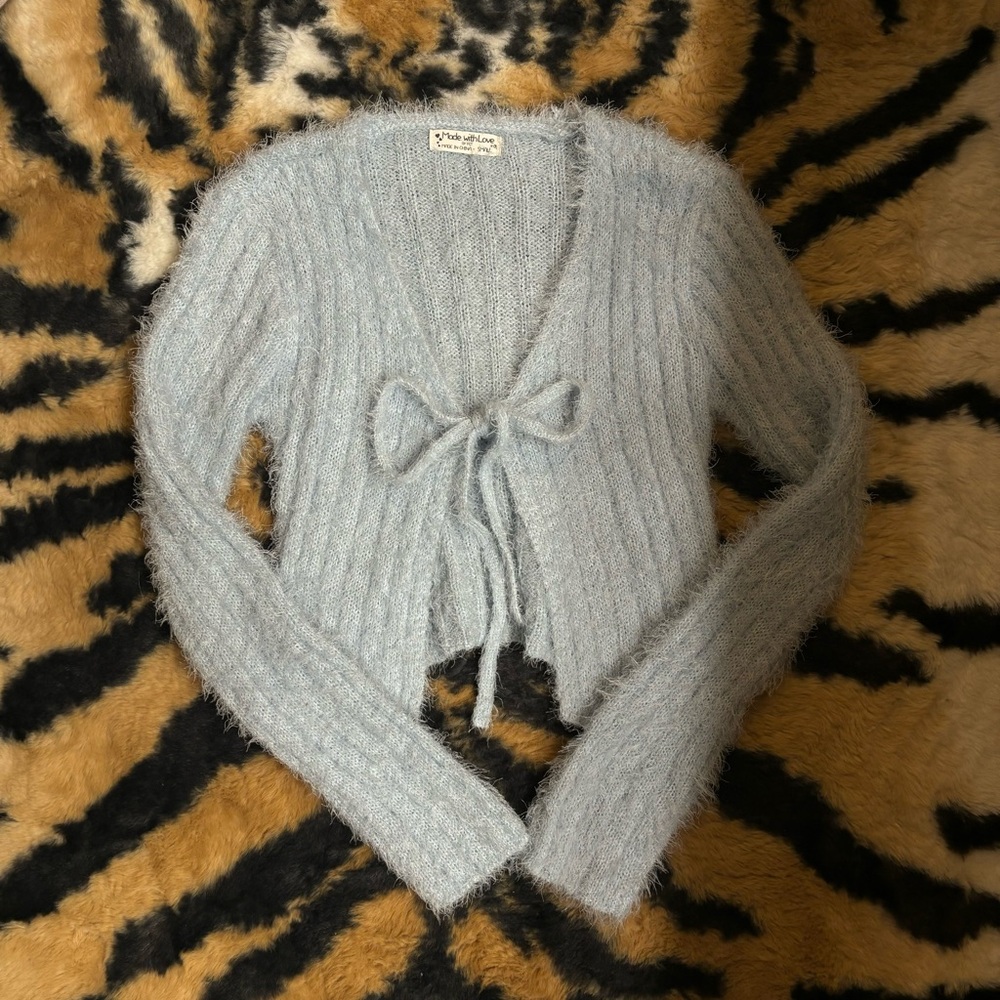 Light blue front tie long sleeve sweater